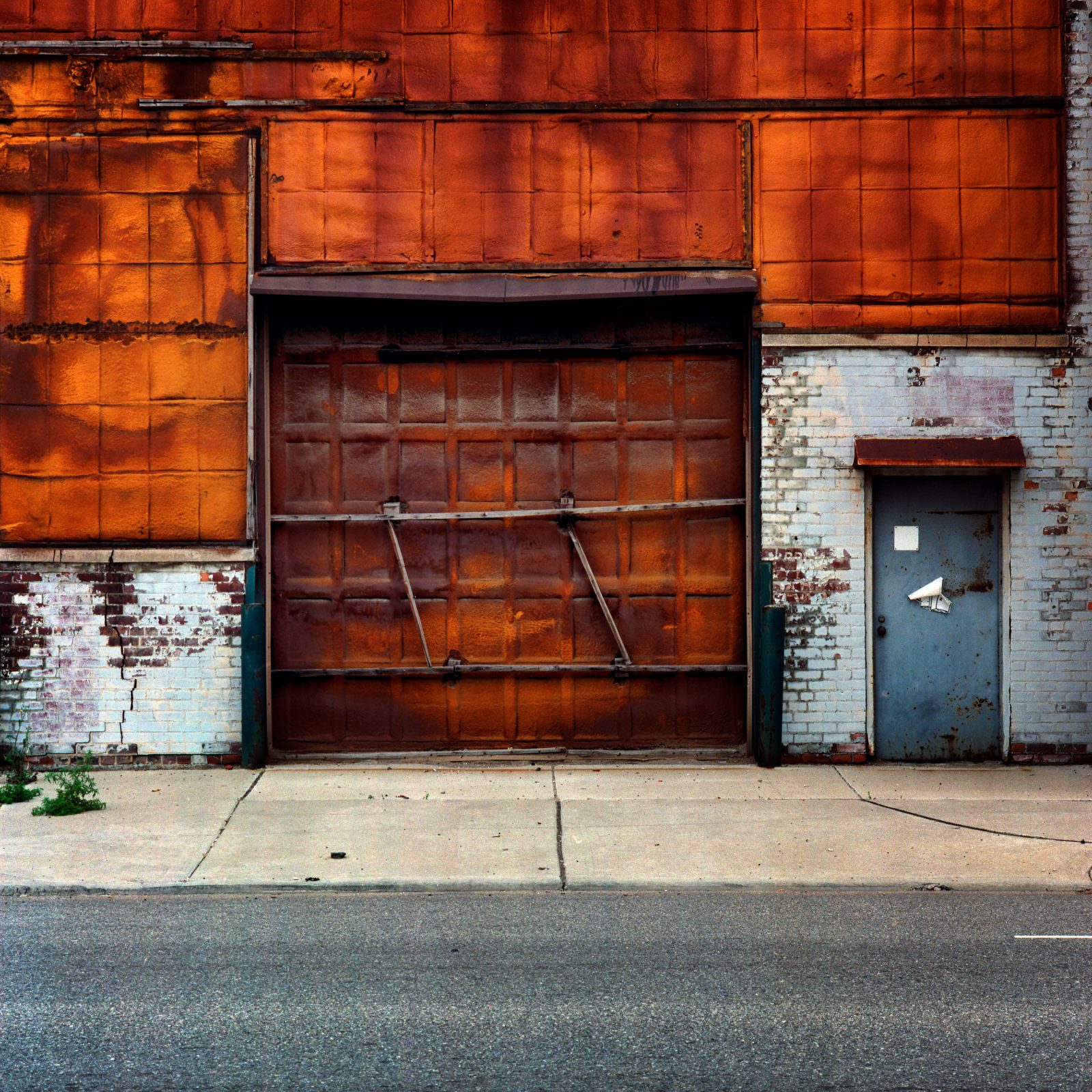 Orange wall and door. Detroit.